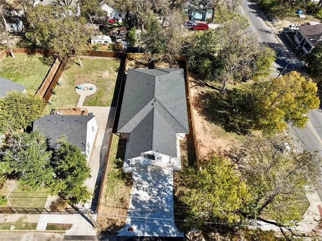 a view of a house with a tree