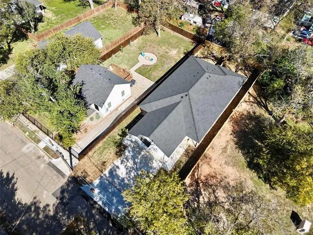 a view of a yard from a balcony