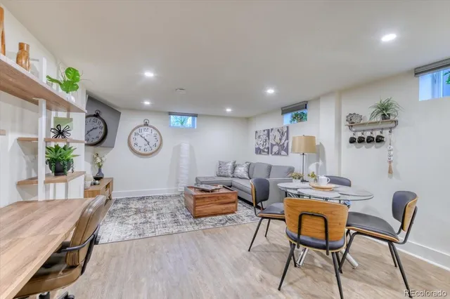 a living room with furniture and a table