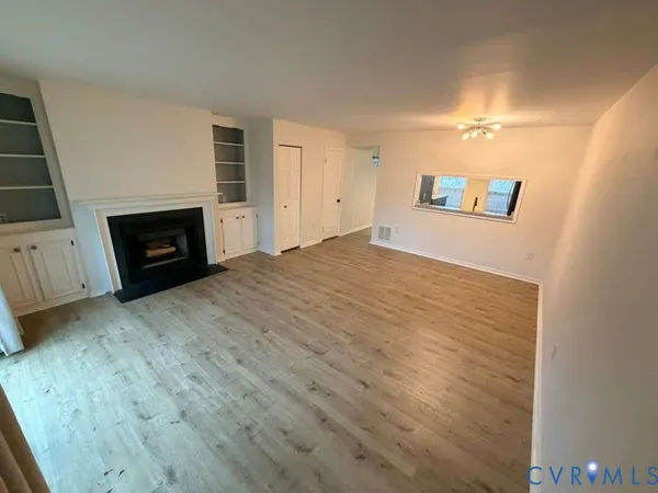 a view of a livingroom with a fireplace