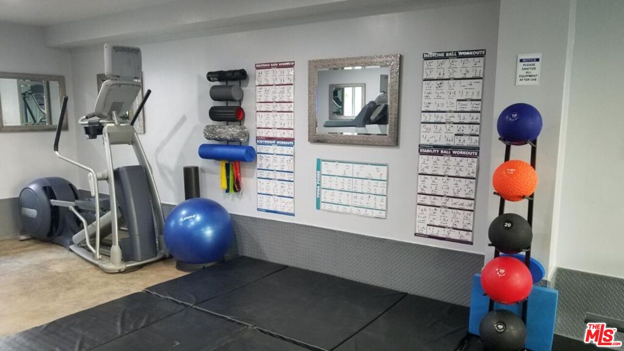 2721 2nd Street, Unit 207 Santa Monica, CA 90405 - Photo 8 of 11 a view of a workspace with furniture and closet