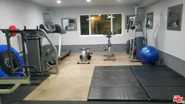 a view of a room with gym equipment