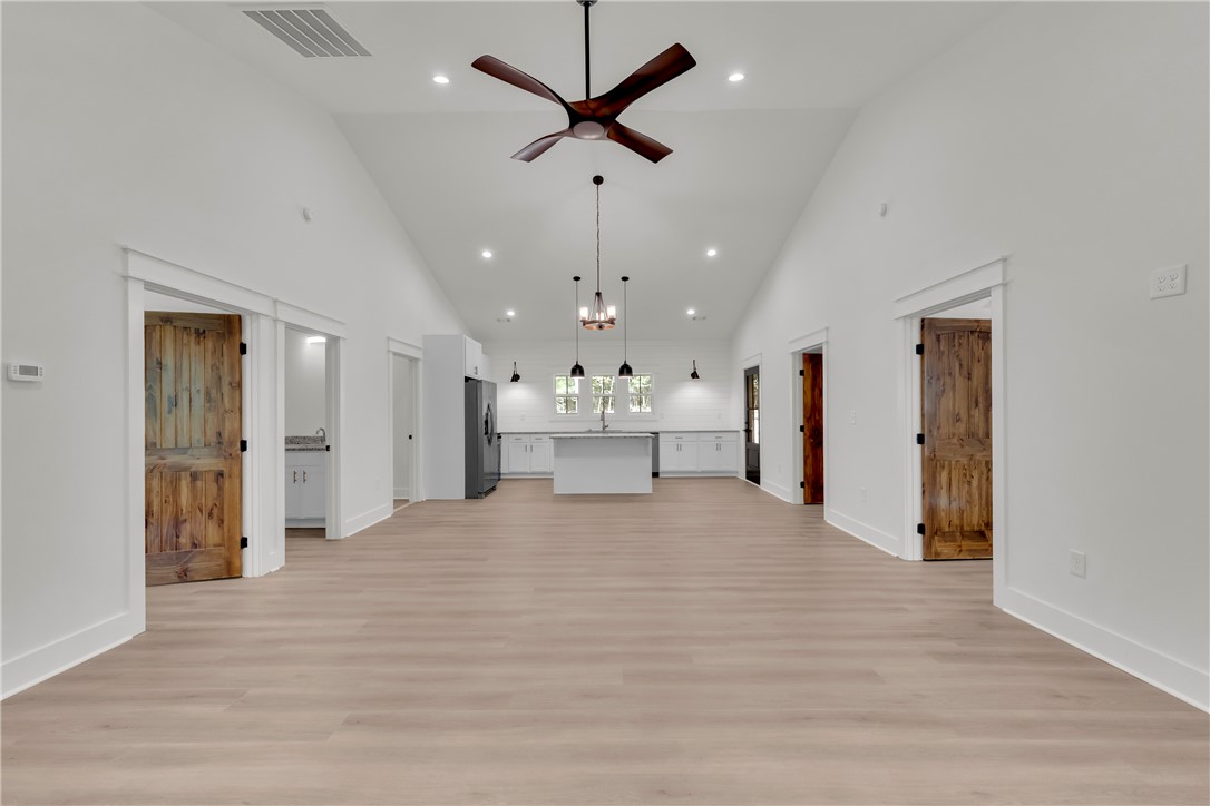 659 White Oak Farms Road Tamassee, SC 29686 - Photo 50 of 50 Vaulted ceilings and wide-plank flooring define this airy open floor plan.
