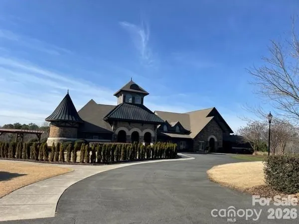 a front view of a house with yard