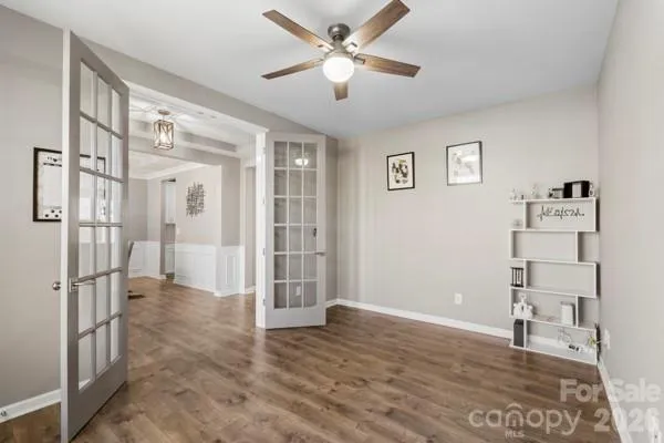 a view of livingroom with hardwood floor and ceiling fan
