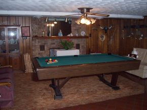 1309 Silver Grove Road Bluff City, TN 37618 - Photo 9 of 10 Game room with wood stove