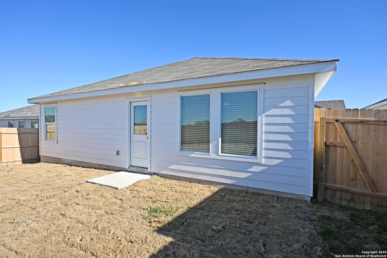 3837 Low Tide Seguin, TX 78155 - Photo 19 of 20 a view of house with backyard and trees