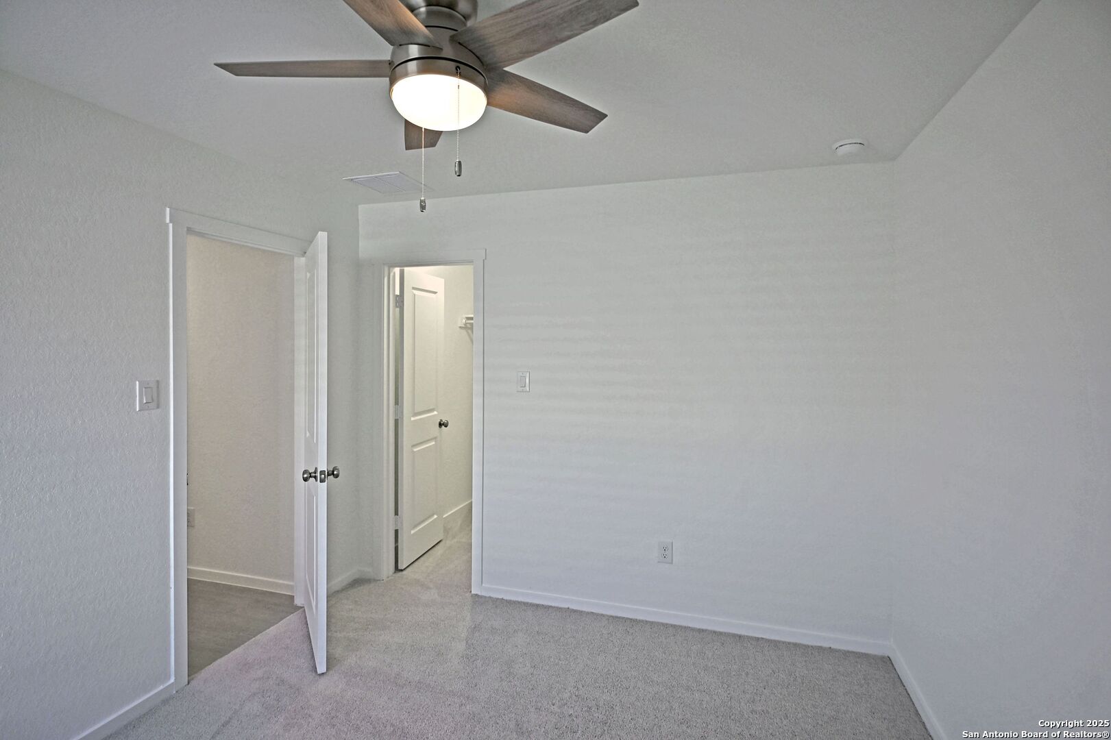 3837 Low Tide Seguin, TX 78155 - Photo 7 of 20 a view of an empty room with a fan