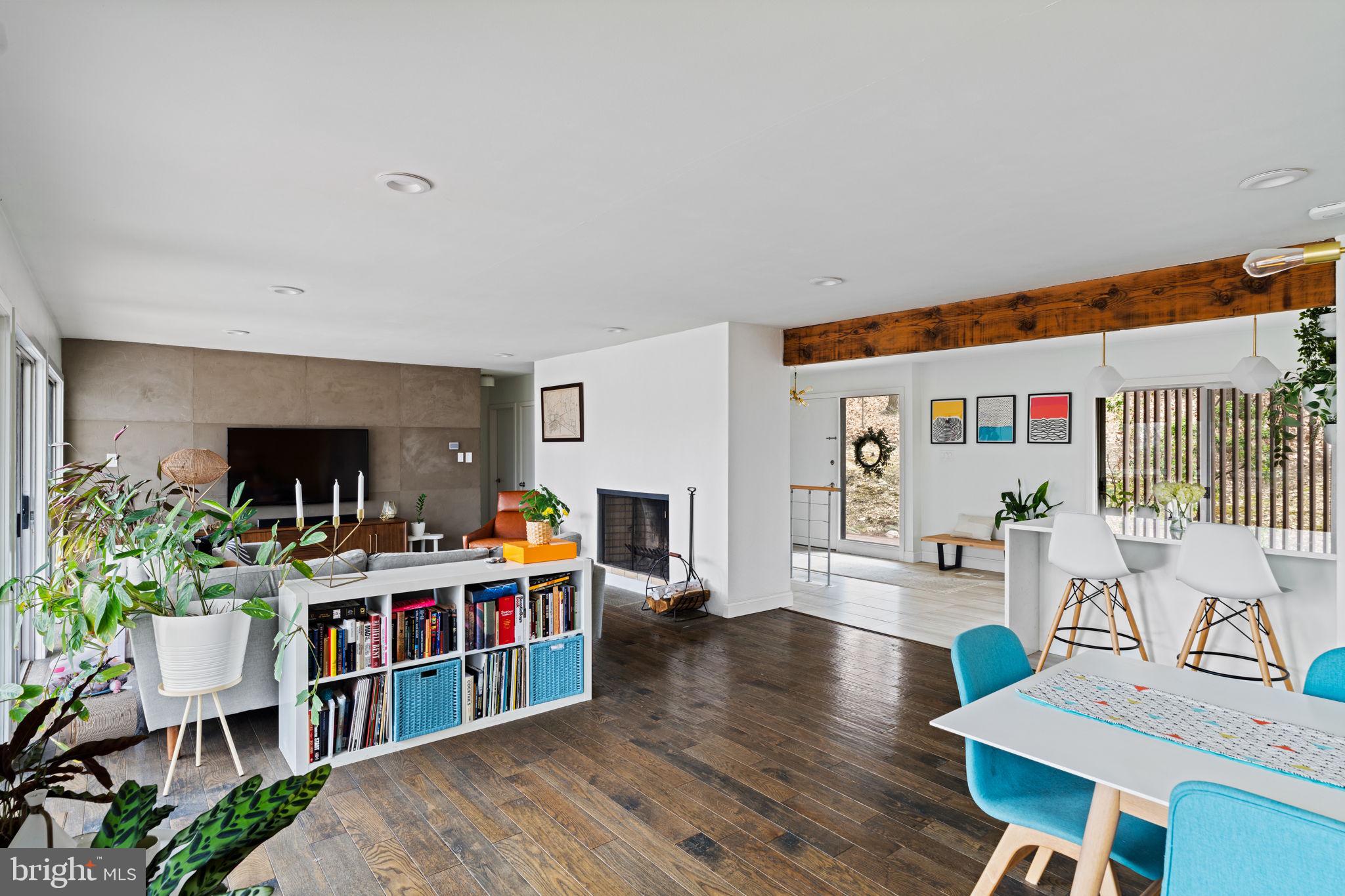 727 North Valley Forge Road Devon, PA 19333 - Photo 32 of 74 a living room with furniture a flat screen tv and a book shelf