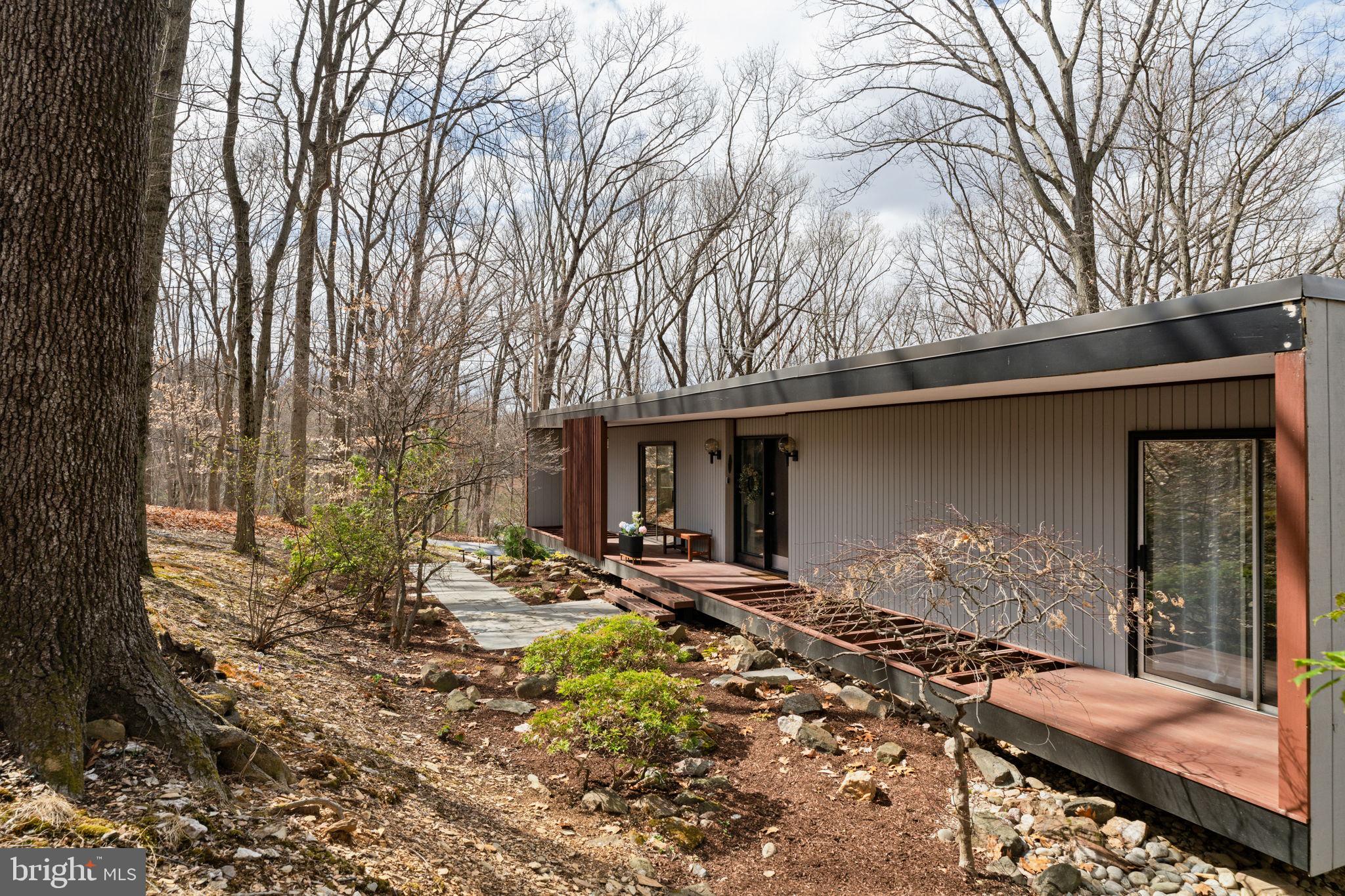 727 North Valley Forge Road Devon, PA 19333 - Photo 6 of 74 a backyard of a house with table and chairs