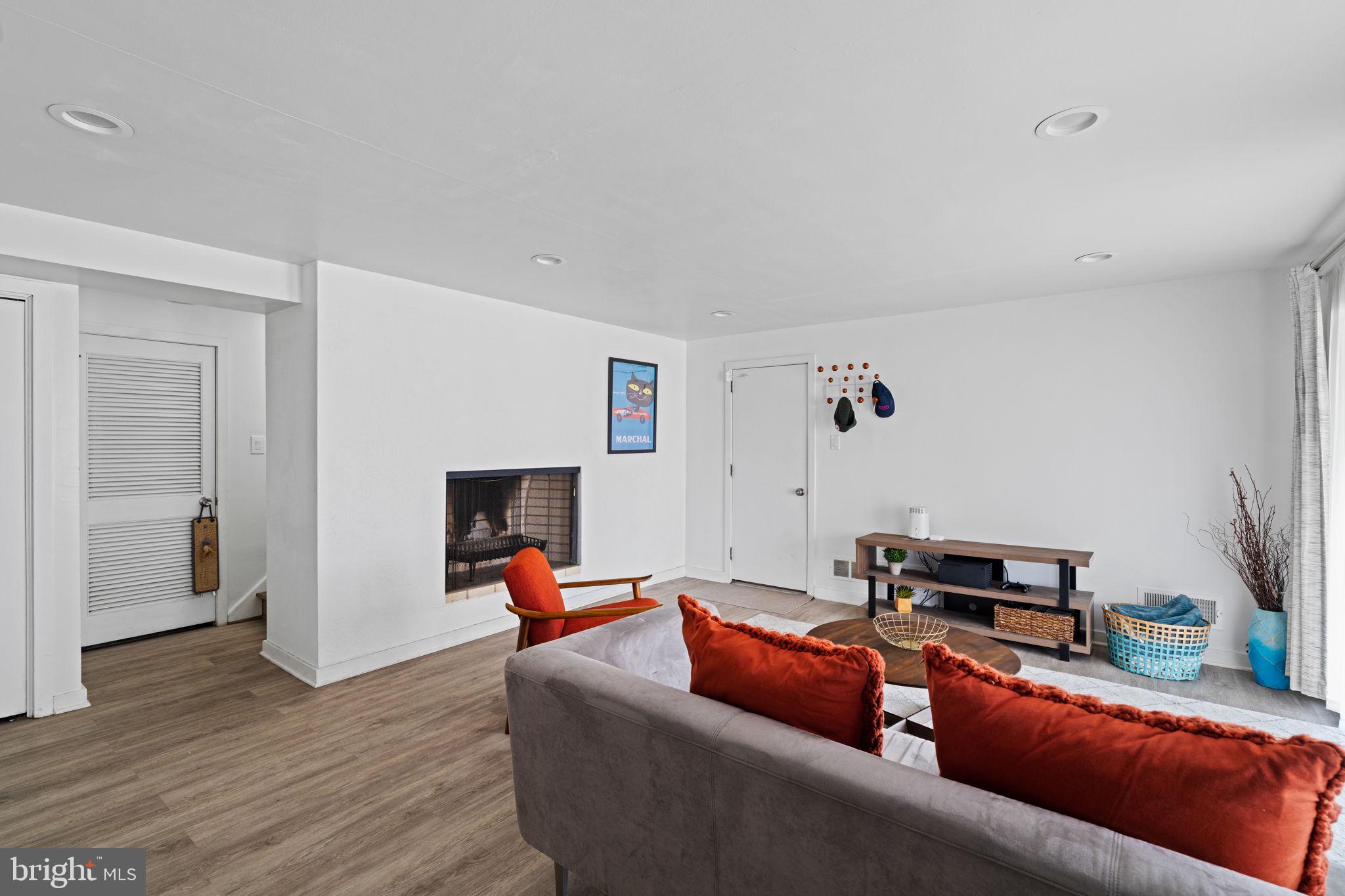 727 North Valley Forge Road Devon, PA 19333 - Photo 64 of 74 a living room with furniture and a fireplace