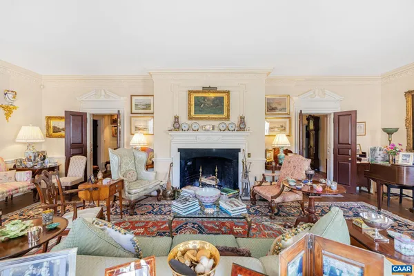 a dining room with a table and chairs