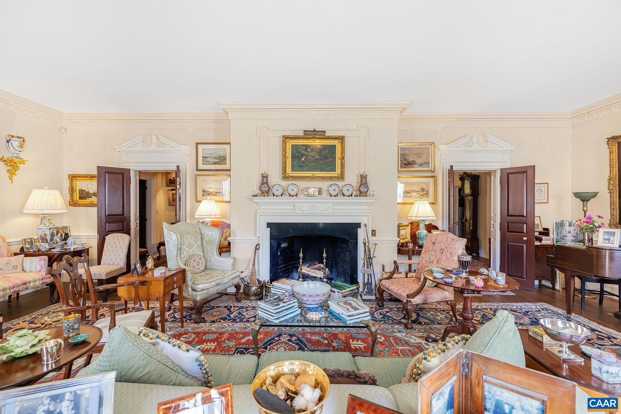 19184 Mt Sharon Road Rapidan, VA 22733 - Photo 16 of 74 a living room with furniture and a fireplace