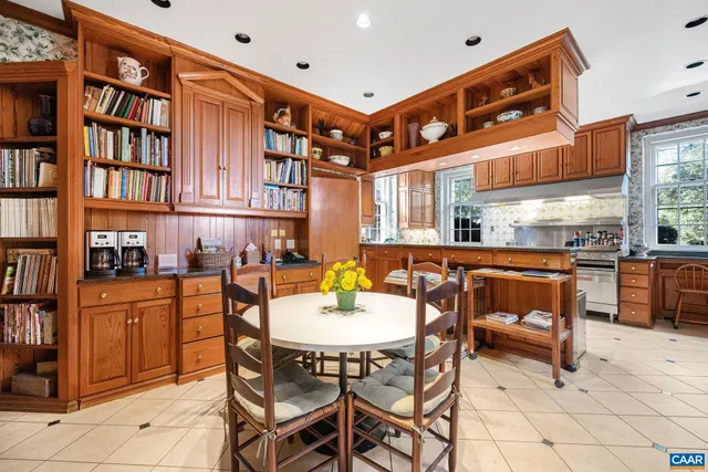 a bed room with a bed and a fireplace