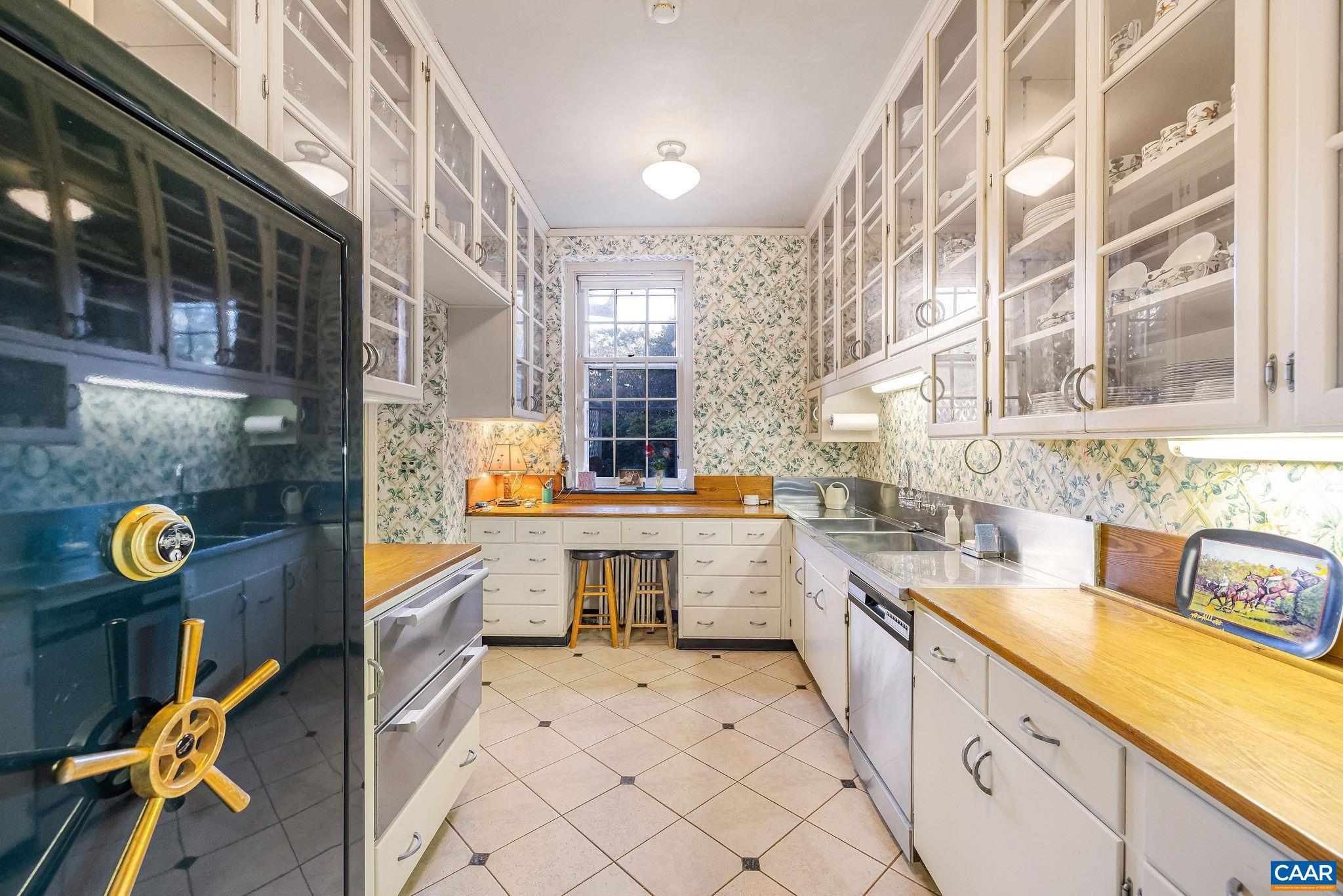 19184 Mt Sharon Road Rapidan, VA 22733 - Photo 25 of 74 a large white kitchen with a sink and cabinets