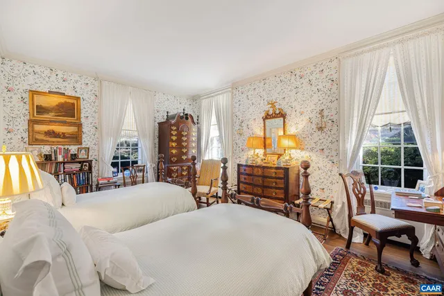 a utility room with cabinets dryer and washer