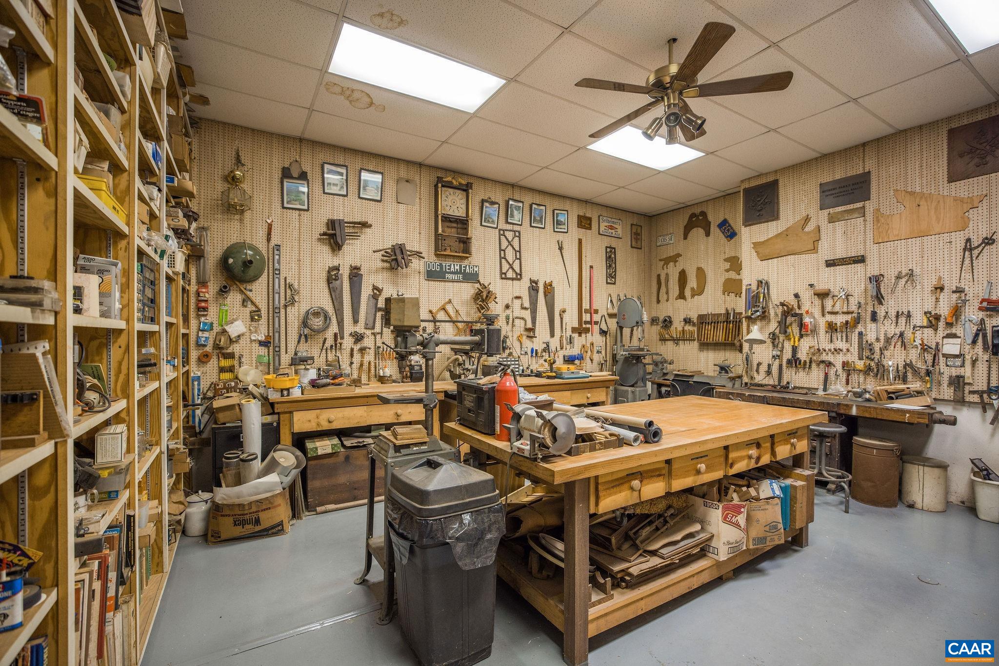 19184 Mt Sharon Road Rapidan, VA 22733 - Photo 40 of 74 a utility room with stainless steel appliances lots of white furniture