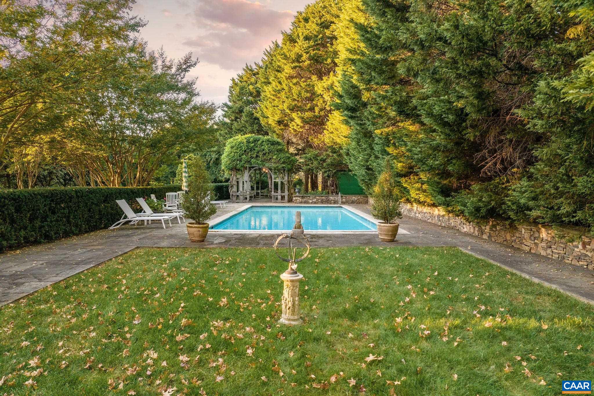 19184 Mt Sharon Road Rapidan, VA 22733 - Photo 63 of 74 a swimming pool with outdoor seating and yard
