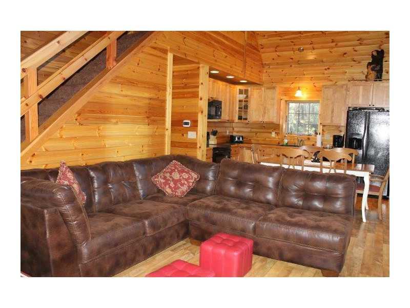 83 Rocky Road Bryant Pond, ME 04219 - Photo 3 of 10 Living Room. Large over sized couch...