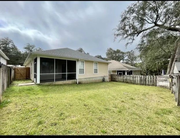 a house view with a garden space