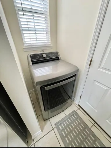 a kitchen with a stove and a microwave