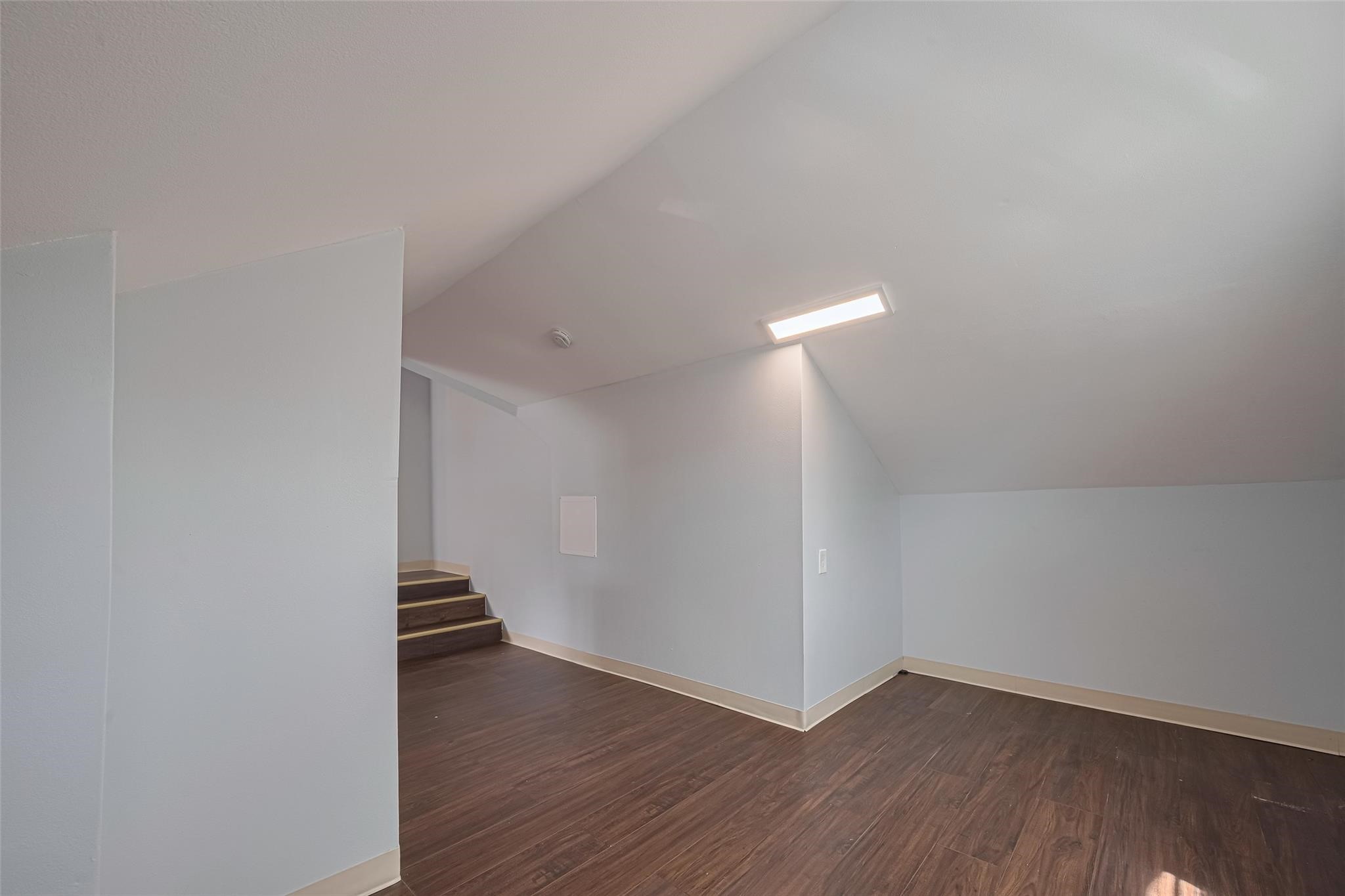 845 Columbia Street, Unit C Houston, TX 77007 - Photo 8 of 12 a view of an empty room with wooden floor