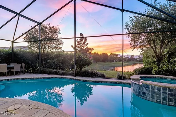 a view of a lake with a sitting area
