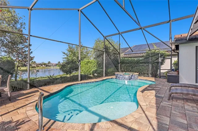 a view of a backyard with sitting area