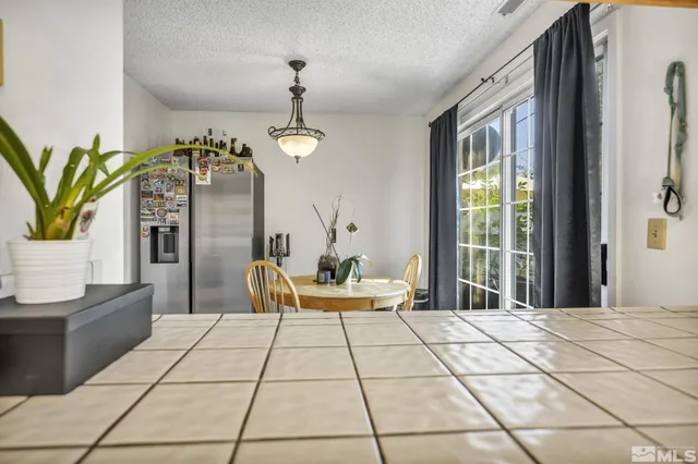 a bed room with a bed and a table