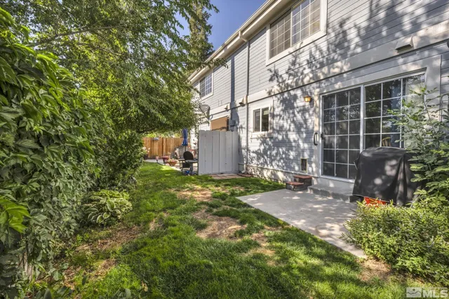 a backyard of a house with lots of green space