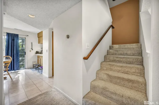 a view of an entryway with staircase
