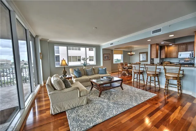 a living room with furniture and a table
