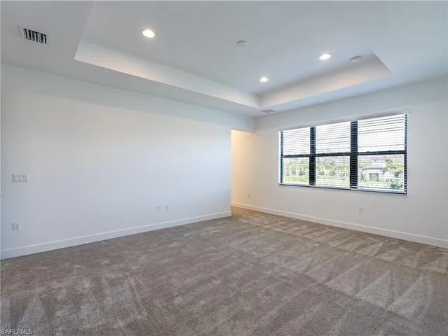 a view of hallway with a window