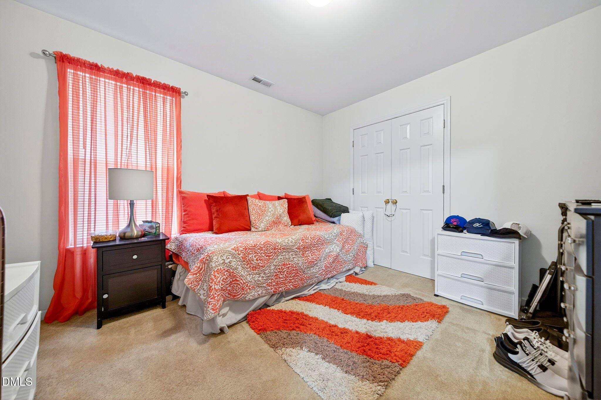 6010 San Marcos Way Raleigh, NC 27616 - Photo 16 of 22 a bedroom with two beds and a closet