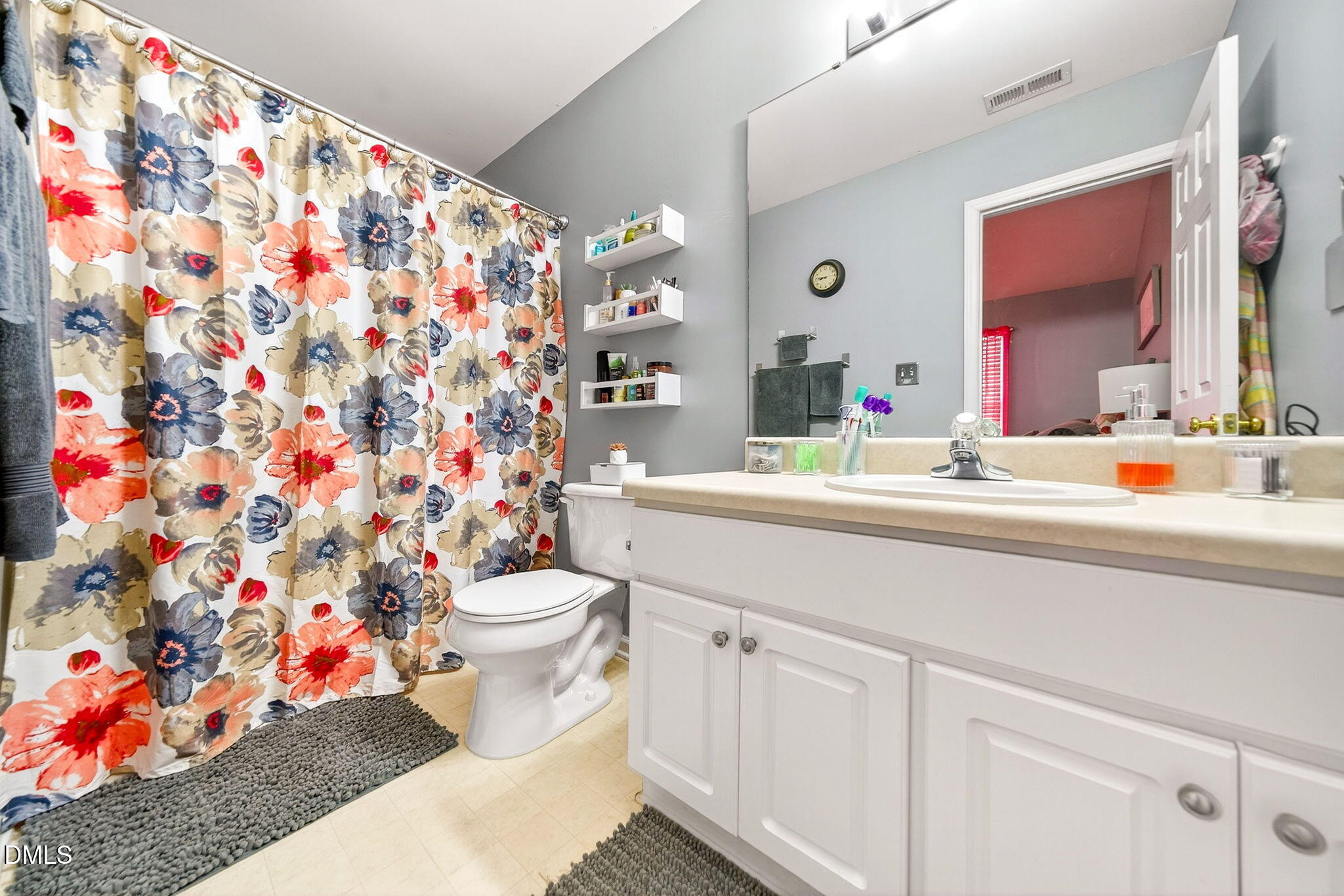 6010 San Marcos Way Raleigh, NC 27616 - Photo 21 of 22 a bathroom with a sink toilet and shower