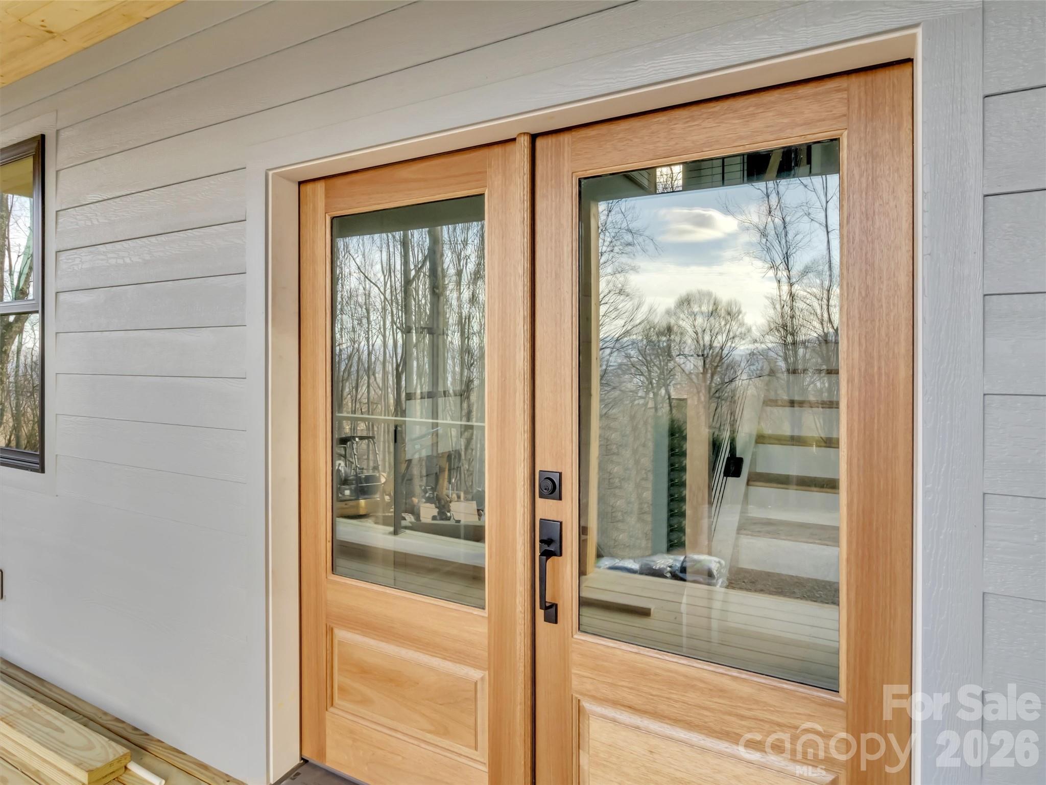 1351 Old Country Road Waynesville, NC 28786 - Photo 2 of 28 a view of a glass door and a living room