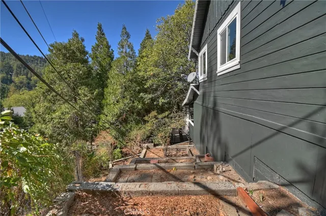 a backyard of a house with lots of green space