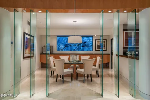 a kitchen with stainless steel appliances granite countertop a stove and a refrigerator