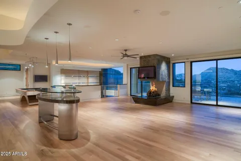 a kitchen with sink refrigerator and window