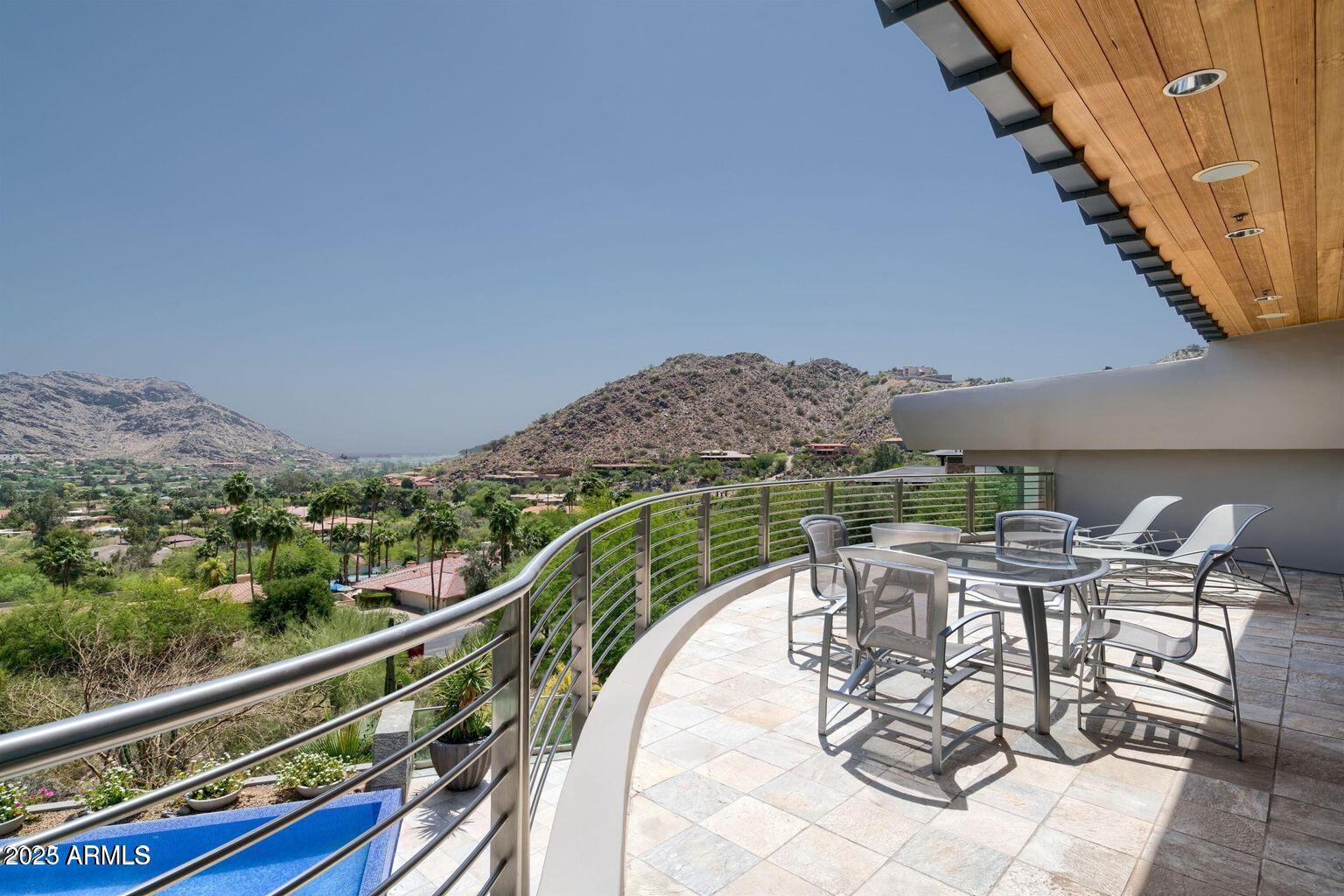 4550 East Foothill Drive Paradise Valley, AZ 85253 - Photo 29 of 58 a view of a balcony with furniture and city view