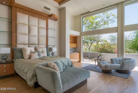 a kitchen with stainless steel appliances granite countertop a sink and a refrigerator