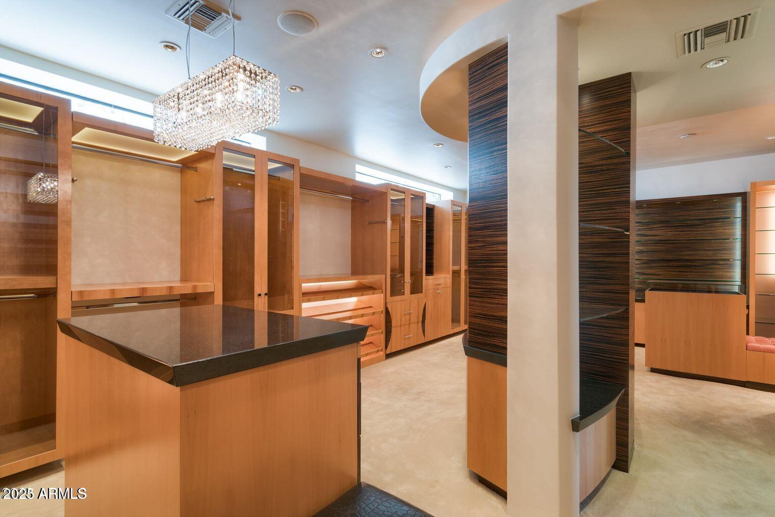 4550 East Foothill Drive Paradise Valley, AZ 85253 - Photo 36 of 58 a kitchen with stainless steel appliances granite countertop a sink and a refrigerator