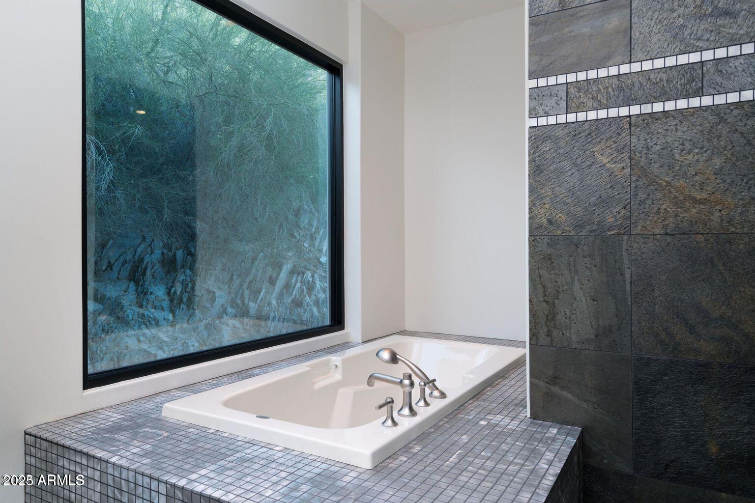 4550 East Foothill Drive Paradise Valley, AZ 85253 - Photo 39 of 58 a bath tub sitting next to a shower