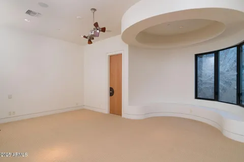 a bathroom with a shower and a sink