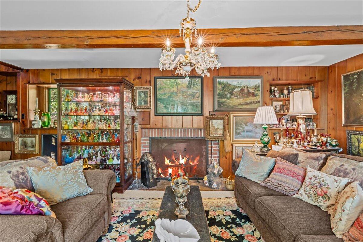 1341 Beaver Valley Road Stroudsburg, PA 18360 - Photo 13 of 84 a living room with furniture and a chandelier