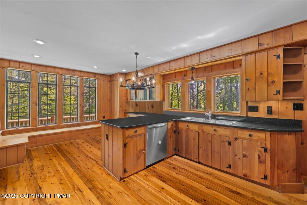 1341 Beaver Valley Road Stroudsburg, PA 18360 - Photo 16 of 84 a large kitchen with stainless steel appliances granite countertop a large window a sink and a counter space