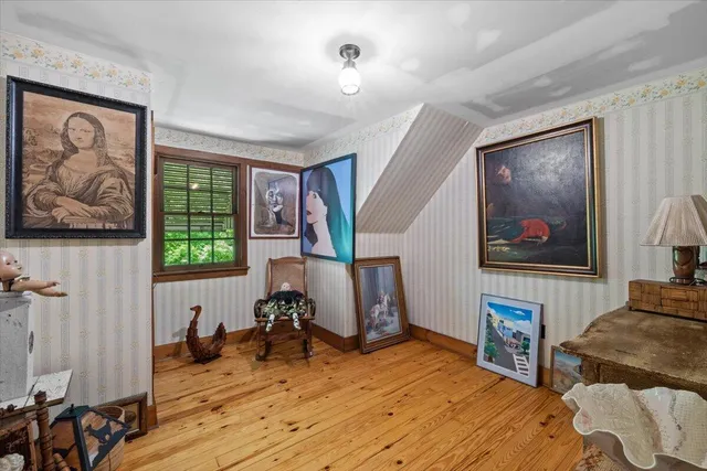 a living room with furniture and window