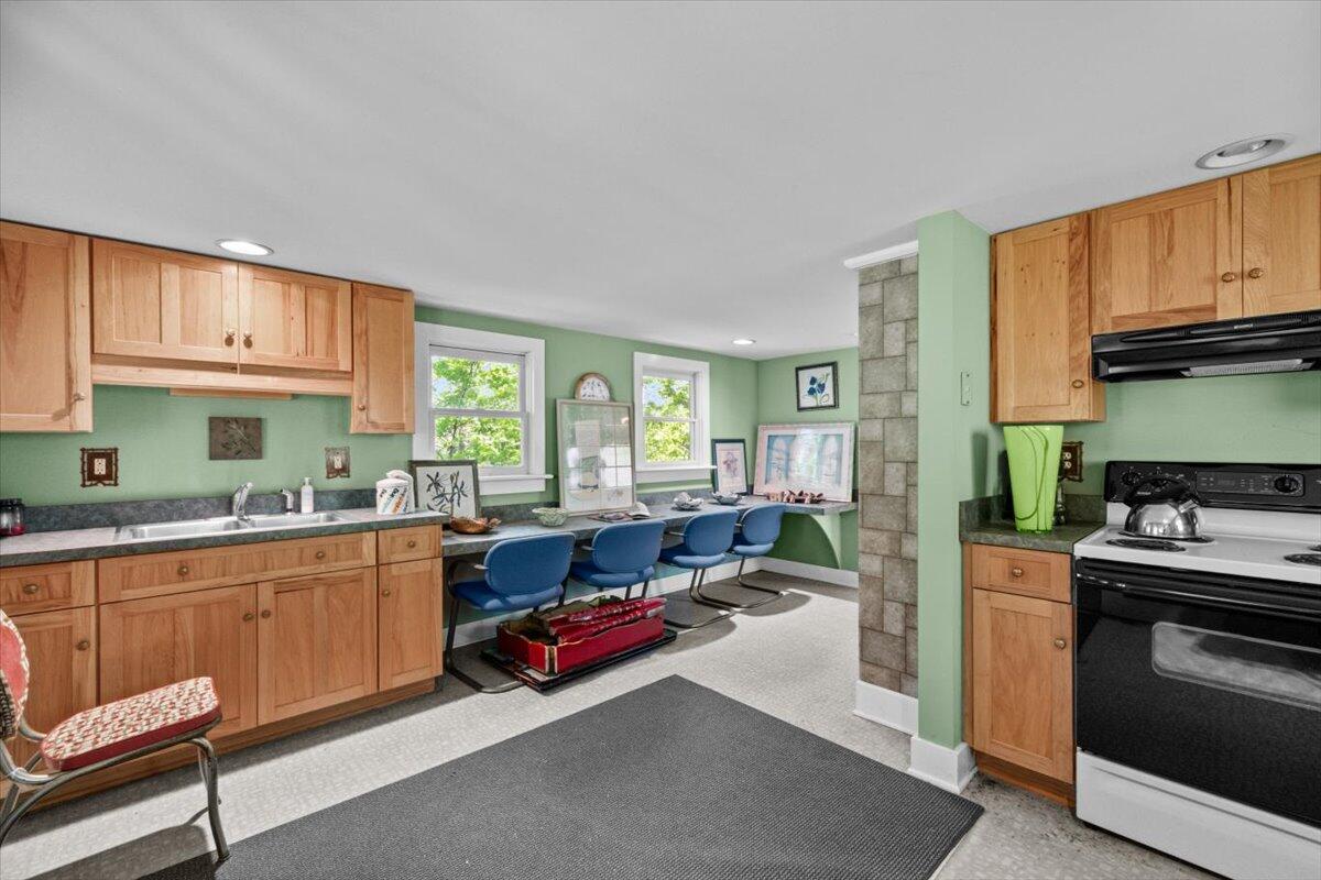 1341 Beaver Valley Road Stroudsburg, PA 18360 - Photo 71 of 84 a kitchen with kitchen island granite countertop a sink and counter top space