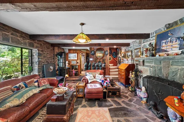 a room with furniture and a large window