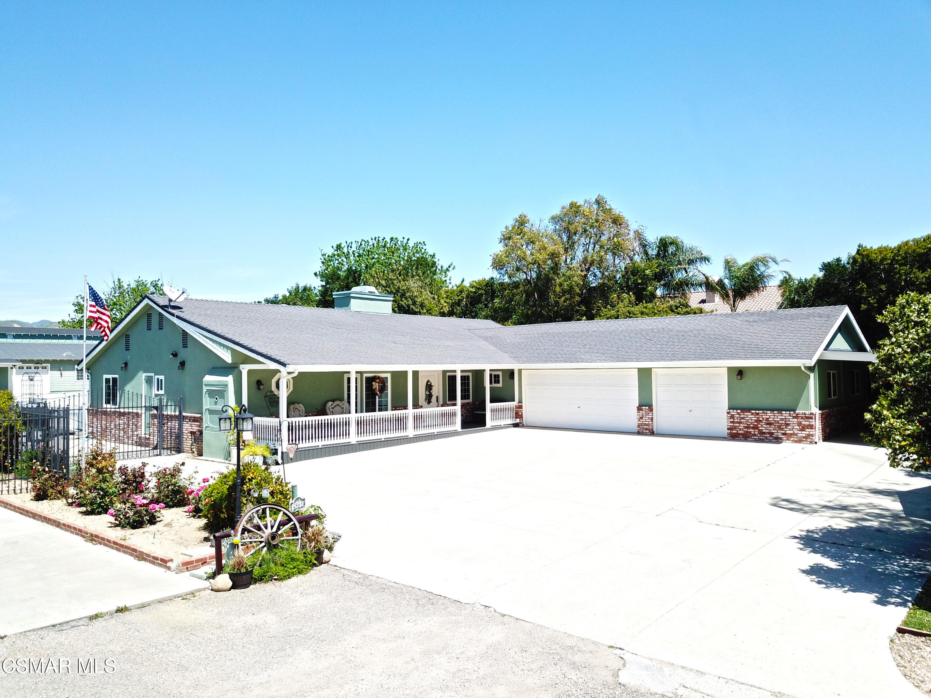 front view of a house with a patio
